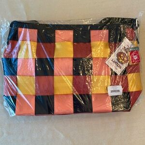 Harveys LTD Jack O’Lantern Messenger bag. New in plastic with pin and tags